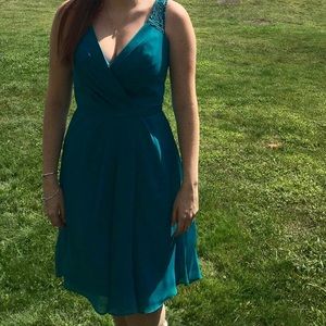 Teal dress.
